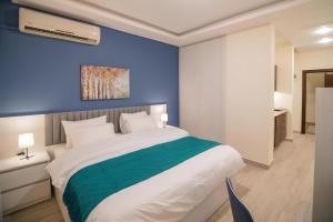 Postel nebo postele na pokoji v ubytování 46 Serviced Apartments + 37 fotografií