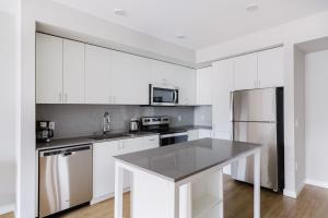 Η κουζίνα ή μικρή κουζίνα στο Blueground Newcastle pool wd nr parks SEA-818