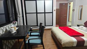 Rúm í herbergi á Hotel Mystic Kakani