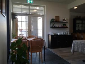 Kuchyň nebo kuchyňský kout v ubytování Hals Hotel