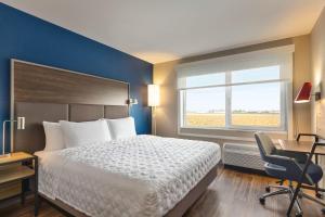 Postel nebo postele na pokoji v ubytování Tru By Hilton Lodi + 16 fotografií