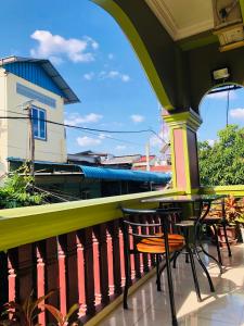 Balkón nebo terasa v ubytování Golden Papaya Guesthouse