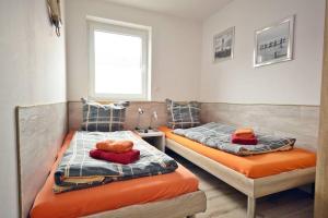 Ένα ή περισσότερα κρεβάτια σε δωμάτιο στο Seestern-7