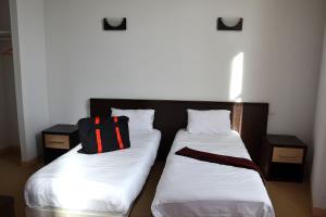 Ein Zimmer in der Unterkunft Hotel Les Bénédictins