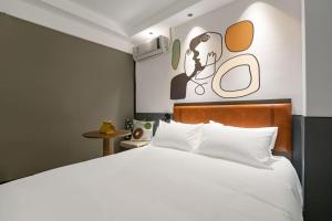 Postel nebo postele na pokoji v ubytování Mcsrh Hotel-Shenzhen Liutang + 15 fotografií