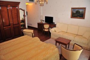 Sjónvarps- og/eða afþreyingartæki á Hotel Borgo Don Chisciotte