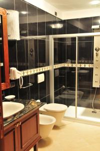 Baðherbergi á Hotel Borgo Don Chisciotte