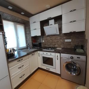 Η κουζίνα ή μικρή κουζίνα στο Comfortable Apartment