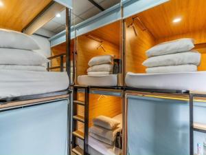 Postel nebo postele na pokoji v ubytování AMANGO HOSTEL