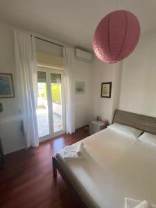 Postel nebo postele na pokoji v ubytování Il Vicolo House Nicolosi