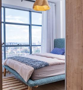 Postel nebo postele na pokoji v ubytování Elite One Bedroom Apartment,Swimming pool, gym, workspace ,Wonderiss Homes close proximity to GTC, JW Mariott and Kempinski