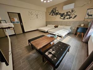 Voodi või voodid majutusasutuse 澎湖紙飛機民宿Paper Jet B&B toas