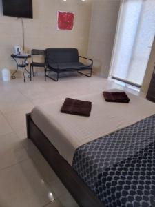 Voodi või voodid majutusasutuse b&b Denis toas