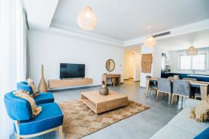 TV a/nebo společenská místnost v ubytování Sun Valley Resort & Residency