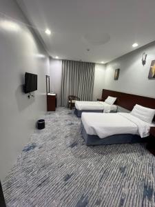 TV a/nebo společenská místnost v ubytování Kol Alayam Hotel + 42 fotografií