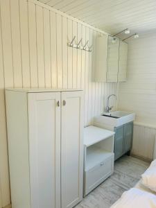 Kuchyň nebo kuchyňský kout v ubytování Beachhouse R&M