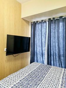 TV/trung tâm giải trí tại Avida Tower Studio unit by PHI Rentals