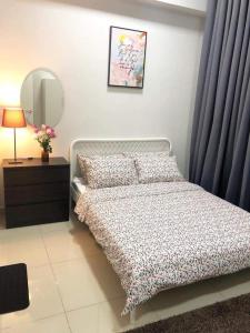 Postel nebo postele na pokoji v ubytování Conezion Residence