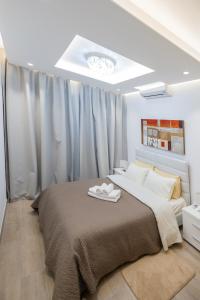 Katil atau katil-katil dalam bilik di Lap of luxury