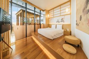 One fine day Jeju Poolvilla客房内的一张或多张床位