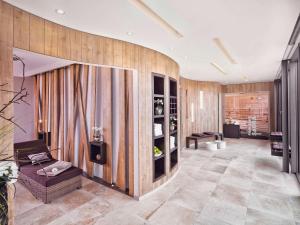 Posezení v ubytování Mövenpick Hotel Münster am Aasee
