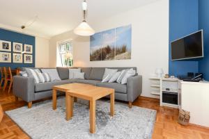 Una televisión o centro de entretenimiento en Haus Falster