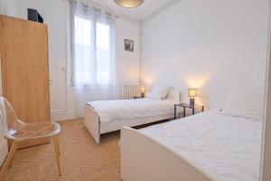 Posteľ alebo postele v izbe v ubytovaní Miraflores, appartement en ville