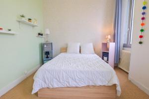 Posteľ alebo postele v izbe v ubytovaní Miraflores, appartement en ville