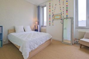 Posteľ alebo postele v izbe v ubytovaní Miraflores, appartement en ville