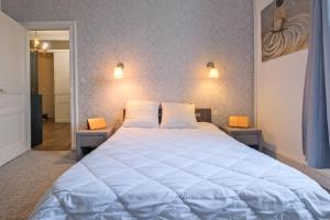 Posteľ alebo postele v izbe v ubytovaní Miraflores, appartement en ville
