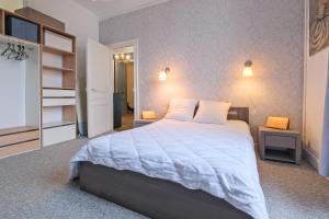 Posteľ alebo postele v izbe v ubytovaní Miraflores, appartement en ville