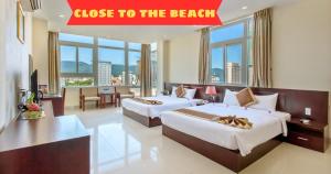 Ένα ή περισσότερα κρεβάτια σε δωμάτιο στο Sunview Beach Hotel Danang