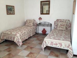 Postel nebo postele na pokoji v ubytování Maison familiale proche Lascaux Lou Cantou