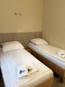 Posteľ alebo postele v izbe v ubytovaní Hotel TM