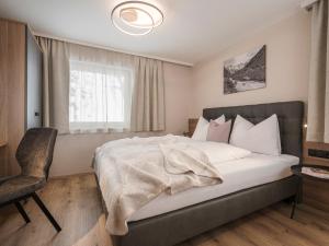 Postel nebo postele na pokoji v ubytování Ferienhaus Evelyn