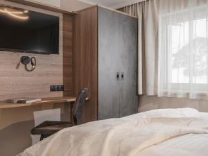 Postel nebo postele na pokoji v ubytování Ferienhaus Evelyn