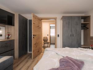 Postel nebo postele na pokoji v ubytování Ferienhaus Evelyn
