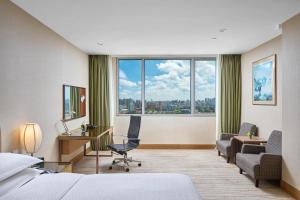 Rúm í herbergi á Four Points by Sheraton Shanghai, Daning