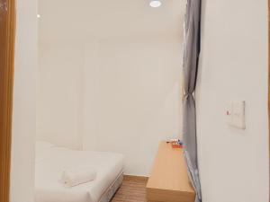 Shoreline Guesthouse 海岸线客栈客房内的一张或多张床位