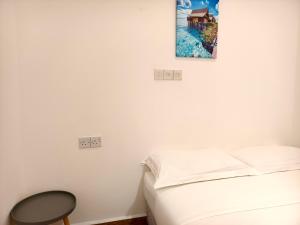 Shoreline Guesthouse 海岸线客栈客房内的一张或多张床位