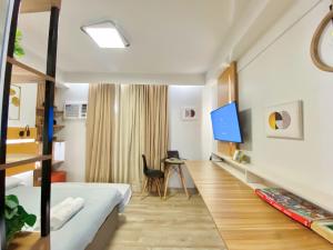 Giường trong phòng chung tại UNIT B218