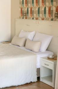 Letto o letti in una camera di Ecoresort Hotel Zefyros