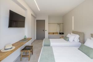 TV a/nebo společenská místnost v ubytování Avithos - Lassu Retreat