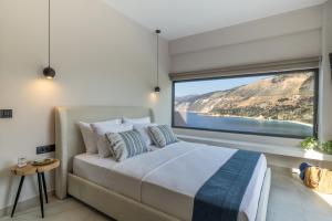 Postel nebo postele na pokoji v ubytování Avithos - Lassu Retreat