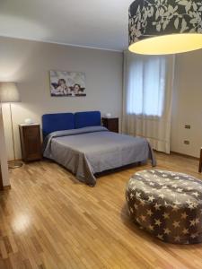 Postel nebo postele na pokoji v ubytování B&B Paolo e Francesca