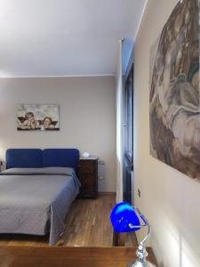 Postel nebo postele na pokoji v ubytování B&B Paolo e Francesca