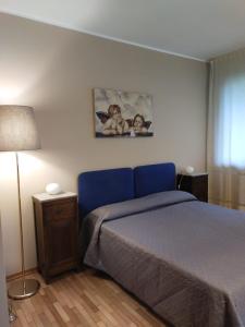 Postel nebo postele na pokoji v ubytování B&B Paolo e Francesca