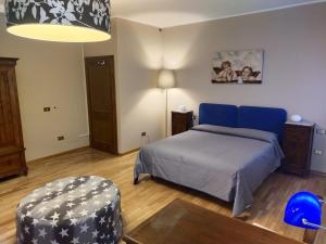 Postel nebo postele na pokoji v ubytování B&B Paolo e Francesca