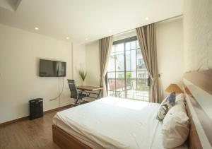 Giường trong phòng chung tại Sumitomo2 - Apartments for Japanese