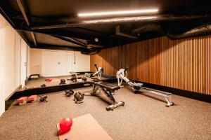 ヴェリエ・デュ・ラックにあるVilla Elegance - Vue Lacのジム(各部屋のエクササイズ機器付)